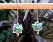 green lampwork bumpy glass earrings